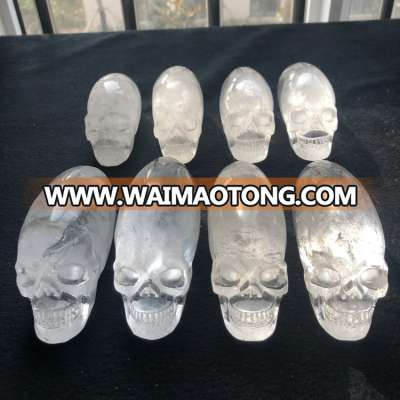 Custom Wholesale Elongated Transparent Hand Carved Quartz Crystal Human HEAD Skulls For Fengshui Decoration